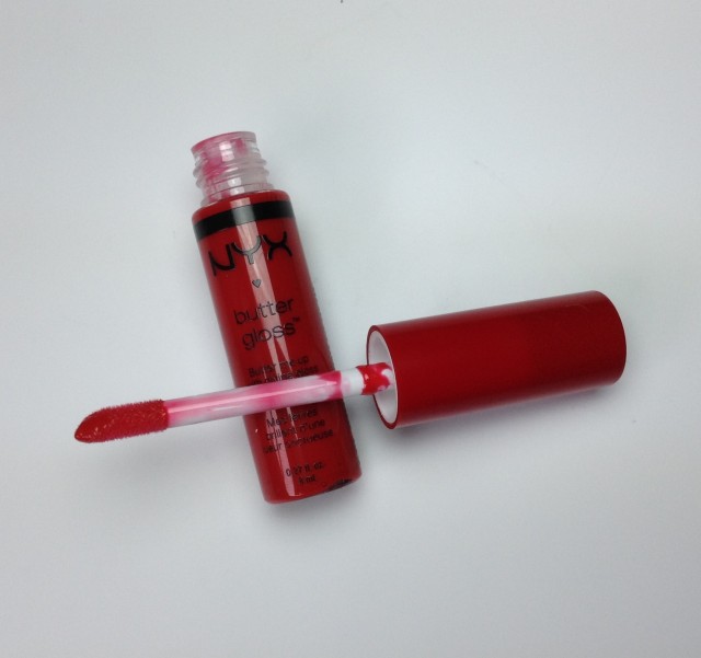 Nxy Butter Gloss in Cherry Pie, which can leave a very soft stain on your lips, just like real cherries (but brighter).