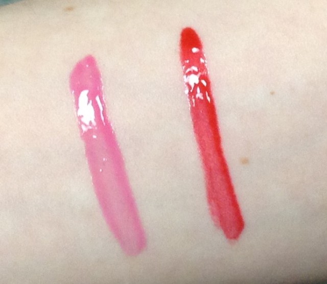 Strawberry Parfait (left) and Cherry Pie (right) swatched under artifical light to show the shine levels.
