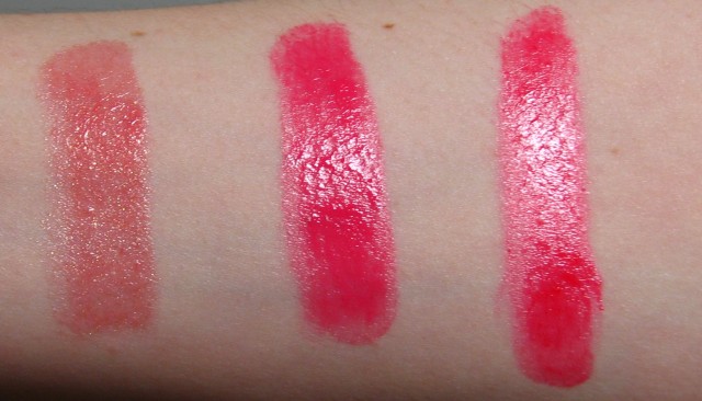 Artificial light, to show the shine. From left: Peach Parfait, Sweet Tart, Wild Watermelon. In this light, Sweet Tart and Wild Watermelon look extremely similar, but this is definitely not the case on the lips!